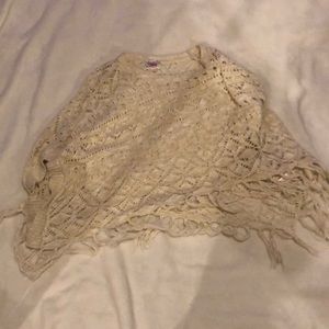Cream colored crochet poncho